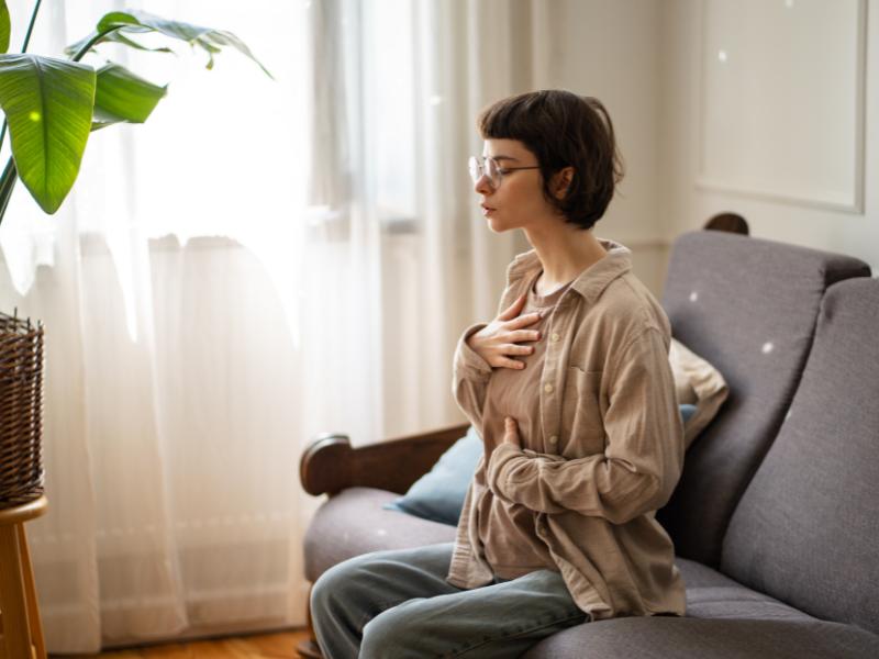 woman practicing body scan meditation, one of the most powerful mindfulness techniques