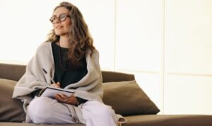 woman journaling in the morning