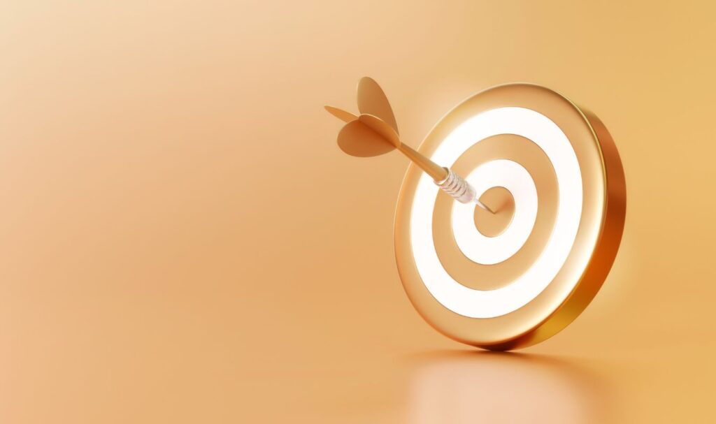 Minimal 3D illustration of a target with an arrow hitting the bullseye, symbolizing clarity of intention when manifesting love.